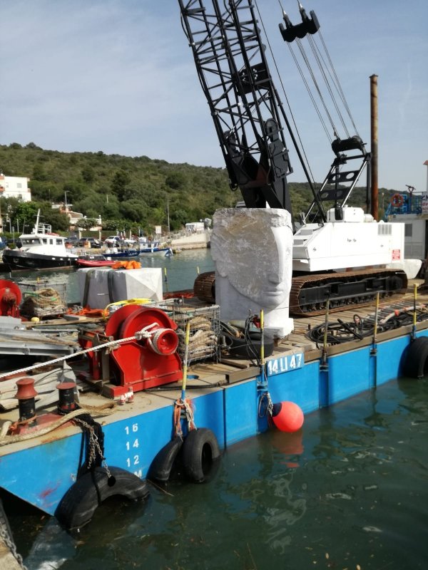 Marble statues on boat